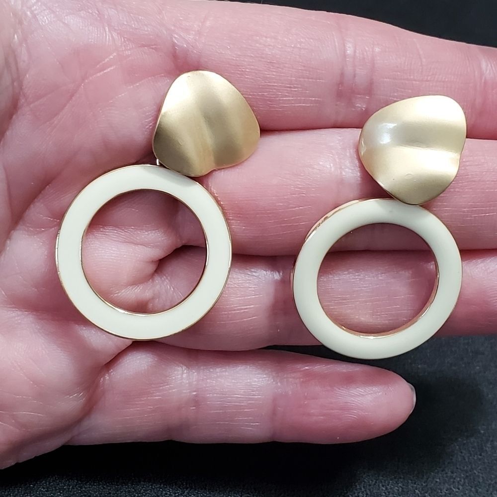 Gold tone cream enamel earrings round dangling